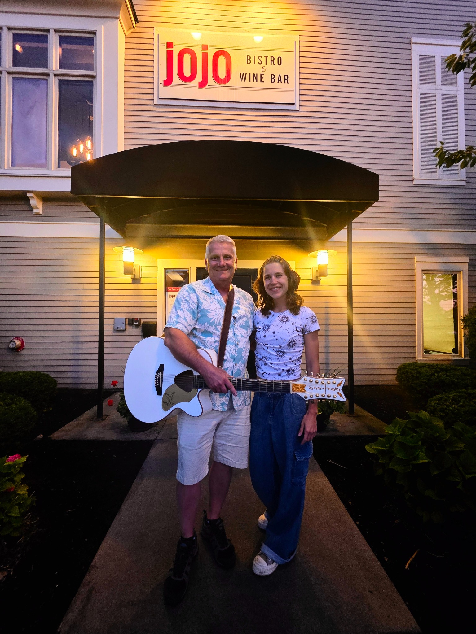 The Serendipity acoustic duo outside JoJo Bistro and Wine Bar